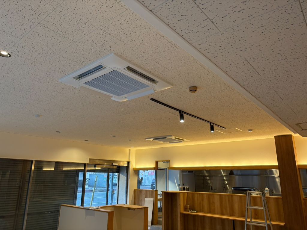 完成した空調設備と誇らしい達成感